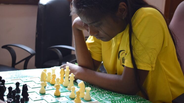 Student from Saksham school, in thinking mode while playing chess