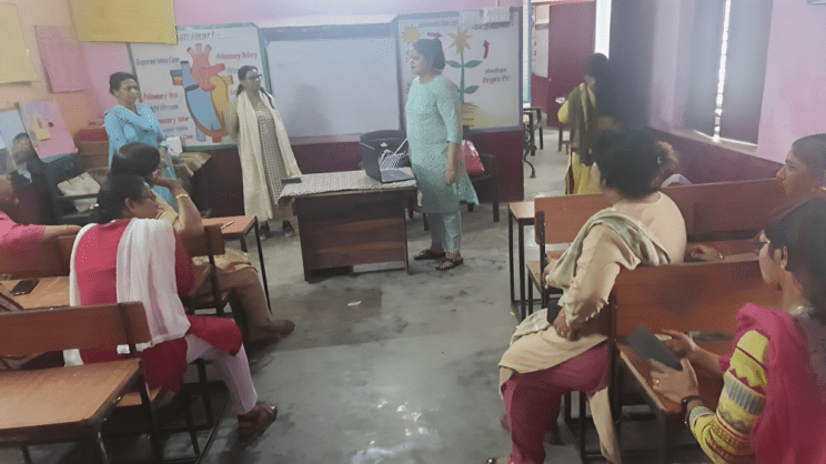Workshop in Composite School, Khairpur under HCL Foundation. In picture, teachers are sitting together in a class room, where Sonali (Senior Program Director) from Saksham is conducting the workshop